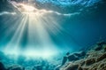 Dark blue ocean surface seen from underwater. Abstract waves underwater and rays of sunlight shining through. Generative AI Royalty Free Stock Photo