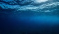 Dark blue ocean surface seen from underwater. Royalty Free Stock Photo