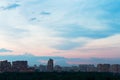 Dark blue and pink dusk sky over urban street i