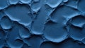 Dark blue rough plasticine texture background. Abstract modelling clay backdrop with uneven surface. Ink blue playdough for web Royalty Free Stock Photo
