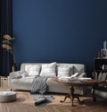 Dark blue Scandinavian home interior with retro furniture, poster wall mock-up in living room Royalty Free Stock Photo