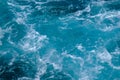 Troubled dark blue sea water with white foam, abstract nature background concept Royalty Free Stock Photo