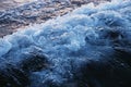 Dark blue sea wave and sea foam close-up Royalty Free Stock Photo
