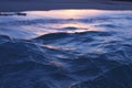 Dark blue sea wave and sea foam close-up Royalty Free Stock Photo