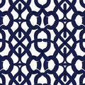 Dark blue seamless pattern with interlocking abstract shapes creating a geometric symmetrical design on a white background Royalty Free Stock Photo
