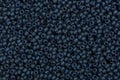 Dark blue seed beads background. High resolution photo. Royalty Free Stock Photo