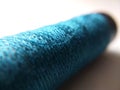 dark blue sewing thread spools