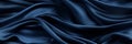 Dark blue silk satin. Soft folds. Fabric. Navy blue luxury background. Space for design.Wavy lines.Banner. Wide.Long. Flat lay, Royalty Free Stock Photo