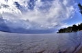 Dark blue sky over the lake before the storm, fish-eye Royalty Free Stock Photo