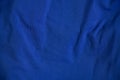 Dark blue soft crumpled fabric as background close up Royalty Free Stock Photo