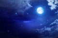 Dark blue starry night cloudy sky big moon universe cosmic cloudy background