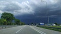 dark blue storm clouds meet all motorists