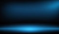 Dark blue studio background with bright light beam Royalty Free Stock Photo