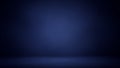 Dark Blue Studio Background with Subtle Spotlight and Floor Shadow Effect navy Royalty Free Stock Photo