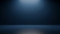 Dark blue studio background with subtle spotlight illumination and a reflective floor surface Keywords: background Royalty Free Stock Photo