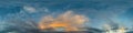 Dark blue sunset sky panorama with golden Cumulus clouds. Seamless hdr 360 pano in spherical equirectangular format Royalty Free Stock Photo