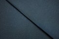 Dark blue textile sample. Fabric texture background concept. Royalty Free Stock Photo