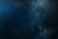 Dark blue textured surface with scattered bright light specks Royalty Free Stock Photo