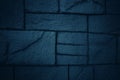 Dark blue tone background with patterned concrete wall Royalty Free Stock Photo