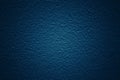 Dark blue tone background with patterned and textured concrete wall surface Royalty Free Stock Photo