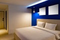 Dark blue tone interior of hotel room with sea view from window. interior room warm light style Royalty Free Stock Photo