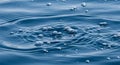 Dark Blue Water Surface with Floating Bubbles Royalty Free Stock Photo