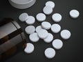 Dark bottle with white pills Royalty Free Stock Photo