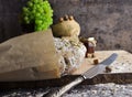 Dark bread, nuts, grapes, honey and a knife Royalty Free Stock Photo