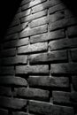 Dark brick wall with dramatic lighting texture and shadow pattern effects Royalty Free Stock Photo