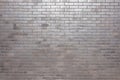 Dark brick wall pattern with chaotic masonry order. Background texture or resource for 3d texturing. Many bricks in big modern Royalty Free Stock Photo