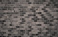 Dark brick wall texture background. Old vintage pattern wallpaper. Grunge brick wall interior building architecture. Rough brick Royalty Free Stock Photo