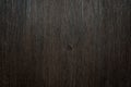 Dark brown background made of a wooden surface Royalty Free Stock Photo