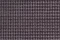 Dark brown background from soft fleecy fabric close up. Texture of textiles macro Royalty Free Stock Photo