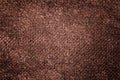 Dark brown background from soft textile material. Fabric with natural texture Royalty Free Stock Photo