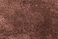 Dark brown background from soft textile material. Fabric with natural texture Royalty Free Stock Photo