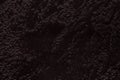 Dark brown background from a soft upholstery textile material, closeup. Royalty Free Stock Photo