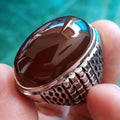 Dark Brown Carnelian Gemstone On Ring Royalty Free Stock Photo