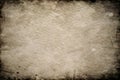 A dark brown grunge texture featuring a rough surface with uneven coloring Royalty Free Stock Photo