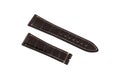Dark brown, leather watchband white stitched at the edges, isolated on white background. Royalty Free Stock Photo