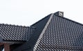 Dark brown metal roof tiles. The roof of corrugated sheet. Roof of a new home Royalty Free Stock Photo