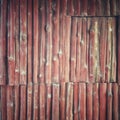 Dark brown old wood texture pattern of the exterior wall cladding.