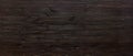 Dark brown painted wooden desk background table wide banner design header Royalty Free Stock Photo