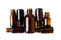 Dark brown phials on white background. Small empty bottles Royalty Free Stock Photo