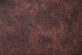 Dark brown plaster texture background, place for text. Top view of stucco wall backdrop for creative design, copy space Royalty Free Stock Photo