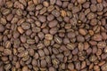 Dark brown roasted coffee beans. Costa Rica La Rosalia mixed wit