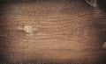 Dark brown scratched wooden cutting board. Wood texture Royalty Free Stock Photo