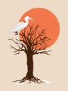 Dark brown silhouette tree with heron at sunset