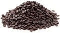 Dark brown, small, seed-like pieces piled high Royalty Free Stock Photo