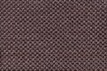 Dark brown textile background with checkered pattern, closeup. Structure of the fabric macro. Royalty Free Stock Photo