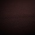 Dark brown textured surface with fine, granular detail. The pattern appears uniform, Royalty Free Stock Photo